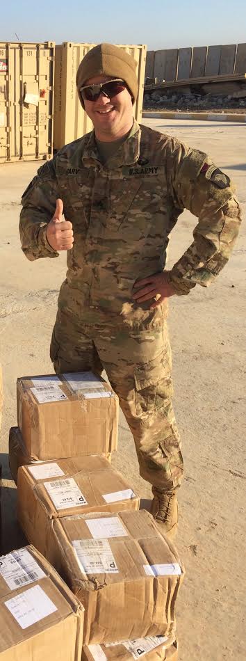 United for the Troops - Soldier receiving packages